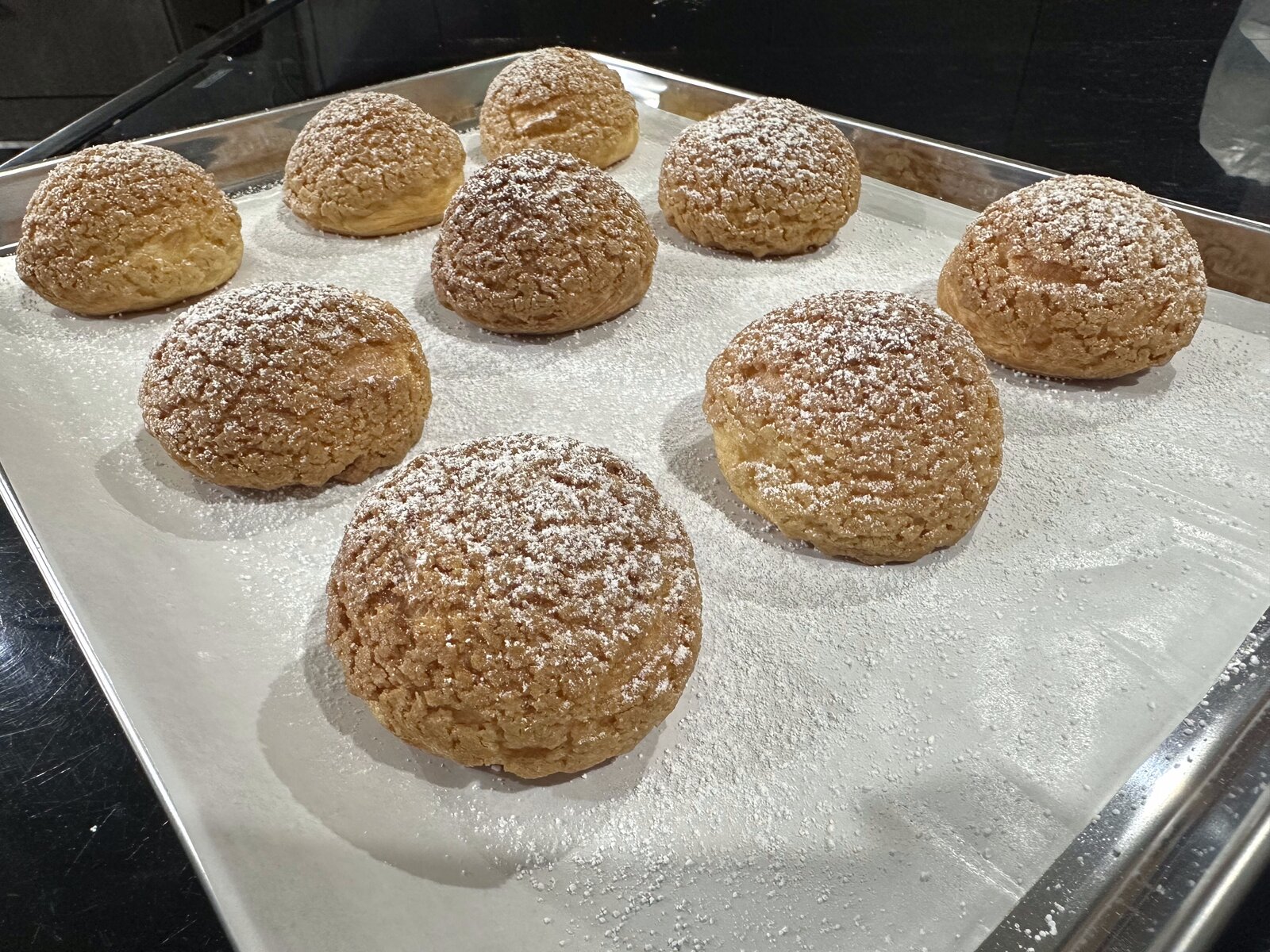 Tray of freshly baked choux pastries